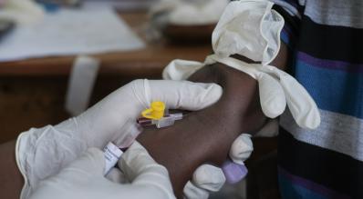 A child participates in the yellow fever clinical trial