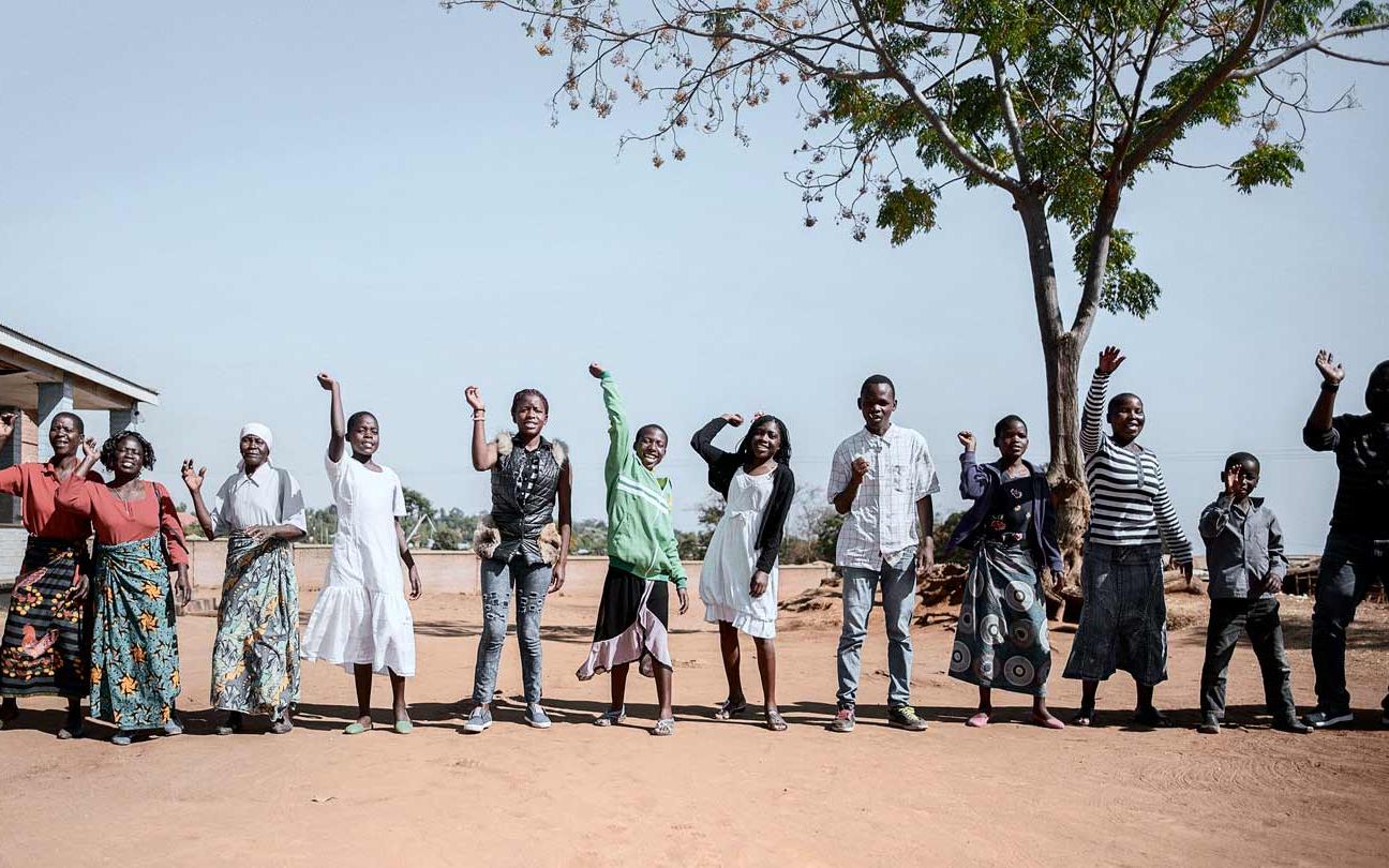 Adolescent HIV project, in Malawi. Dance to start the 'six-months-meeting day' to welcome new members and monitor all the girls and boys who already joined the programme.